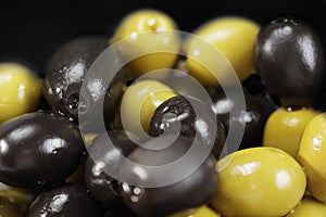 Black and green olives in a bulk