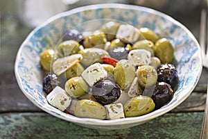 Black green olives with soft cheese