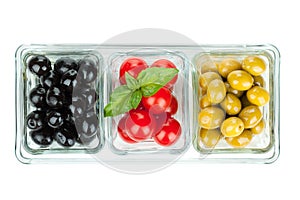 Black and green olives and tomatoes with basil