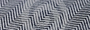 Black and grey herringbone fabric texture background