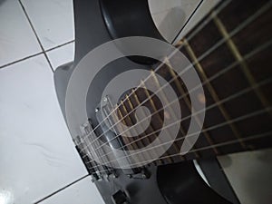 Black guitar six strings