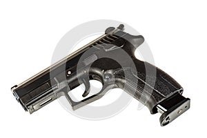 The black gun pistol on a white background close up.