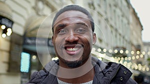 Black Guy On The Street. Face Close Up. Handsome Man With Beard. Guy Stands On The Street And Smiles.
