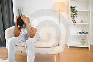 Black guy stressting and headache