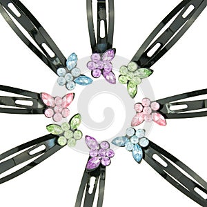 Black hair clip with colorful butterfly put as circle isolated