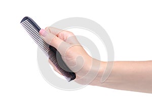 Black hair comb in hand