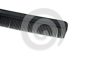 black hair comb isolated on white background photo