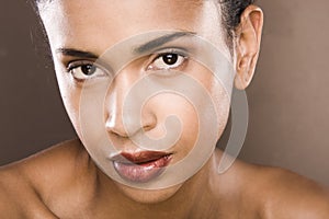 Black hair young woman portrait, studio shot