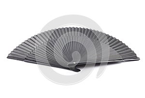 Black hand held fan on a white background