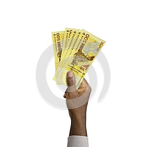 Black Hand holding 3D rendered CFA FRANC notes