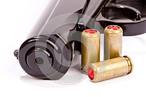 Black handgun And ammunition isolated on white