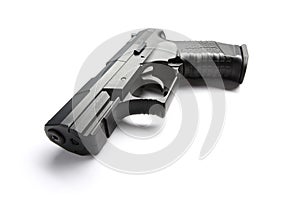 Black handgun on white