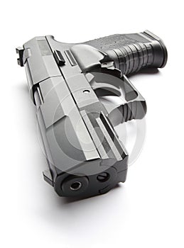 Black handgun on white