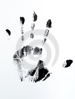 A black handprint on a white background