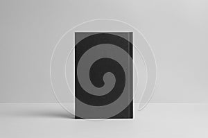 Black Hardcover Book Mock-Up - Backside. Wall Background