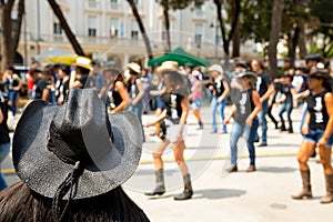 Black hat on flash mob backgroung