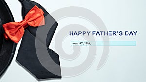 Black hat and red bow tie with a Happy Father\'s Day message