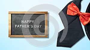 Black hat and red bow tie with a Happy Father\'s Day message