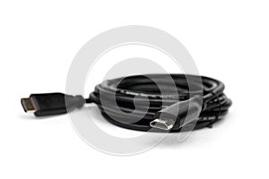 Black HDMI cable coil isolated on white background