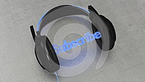 Black headphone with the blue word subscribe between the ear pieces
