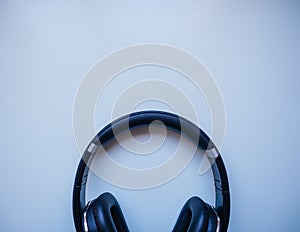 Black headphones with white background. Musical concept