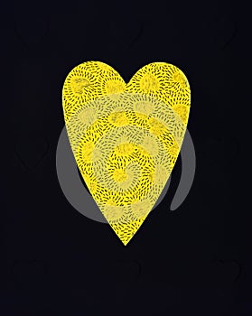 A heart shaped frame with little heart patterns inside it.