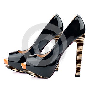 Black high heel shoes isolated on white background.