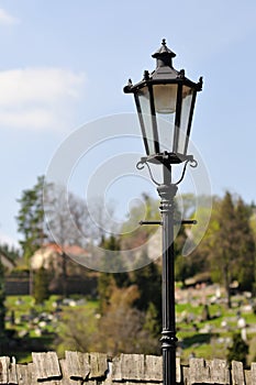 A black historic street lamp