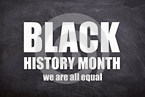 Black history month and we are all equal text in black background.