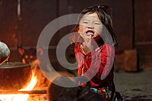 Black Hmong girl making faces