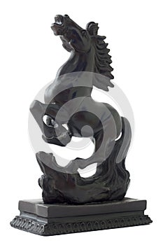 Black horse statue for power.