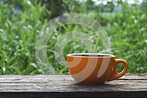 Black hot coffee brown cup on table