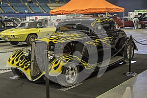 Black hot rod with yellow flames