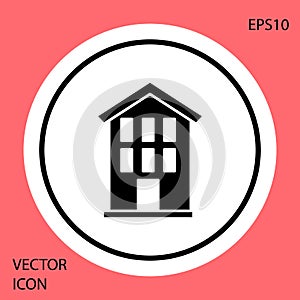 Black House icon isolated on red background. Home symbol. White circle button. Vector