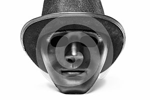 Black human mask in hat