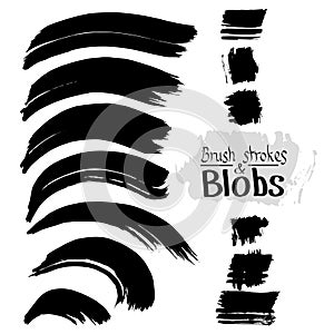 Black ink vector stains and strokes. Vector set of grunge brush strokes.