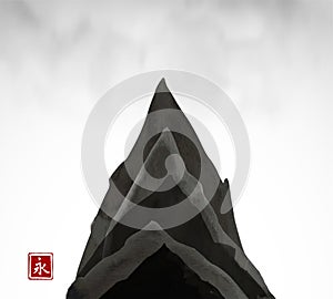 Black ink wash painting of mountain on white background. Traditional Japanese ink painting sumi-e. Contains hieroglyph - photo