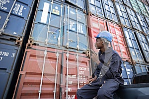 Black Inspector Inspecting the Containers at the Port