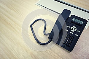 Black IP Phone, Office phone on the modern table in the meeting room