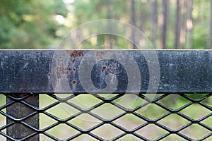 Black Iron Fence with Crisscross Design