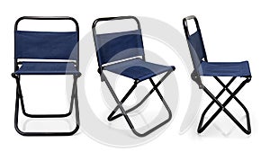 Black iron folding chair with blue fabric isolated on white background photo