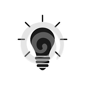 Black isolated icon of light bulb on white background. Silhouette of illuminated lamp. Symbol of idea, creative. Flat design