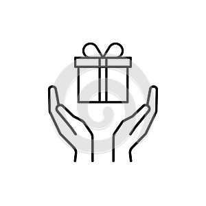 Black isolated outline icon of gift box in open hands on white background. Line icon of gift box and two hands. Give, make a