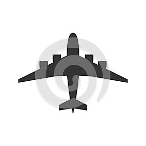Black isolated silhouette of airplane on white background. View from above of aeroplane. photo
