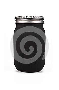 Black jar with milliliter measurement display on white background