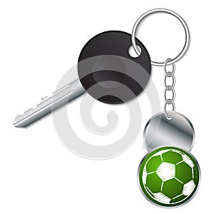 Black key with metallic soccer ball keyholder