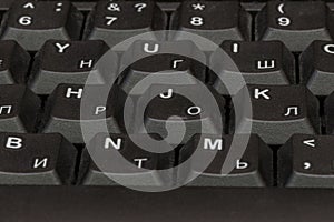 Black keyboard closeup. Keyboard pattern. Horizontal pattern. Vertical pattern.