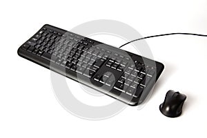 Black keyboard and mouse isolated on white background