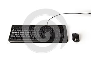 Black keyboard and mouse isolated on white background