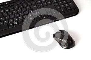 Black keyboard and mouse isolated on white background